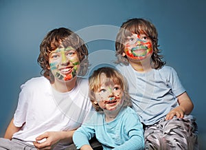 Cheerful brothers with painted faces