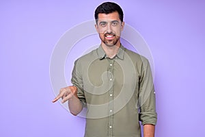 cheerful brunette bearded man demonstrating the letter Q q