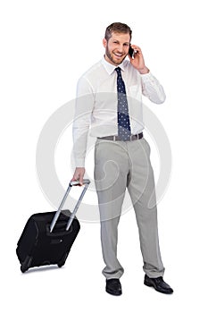 Cheerful businessman answering phone