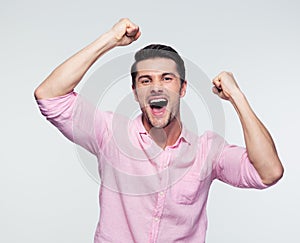 Cheerful businessman celebrating his success