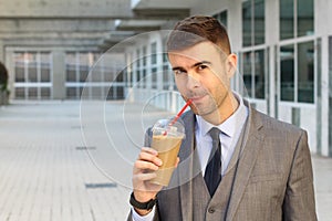 Cheerful businessman during coffee break