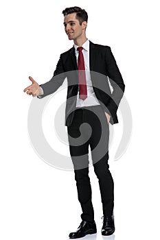 Cheerful businessman and giving a handshake