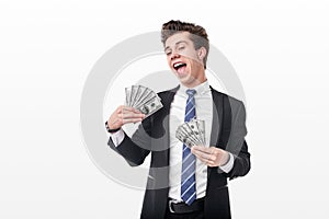 Cheerful businessman with money
