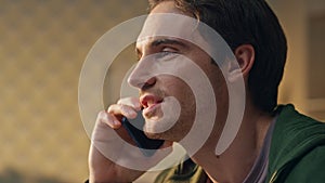 Cheerful businessman phone call speaking office closeup. Man talking smartphone