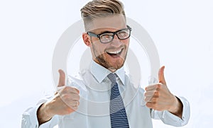 cheerful businessman showing thumbs up