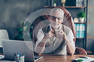 Cheerful careless excited joyful old businessman with bristle is