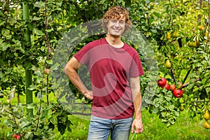 Cheerful Caucasian gardener working in the garden