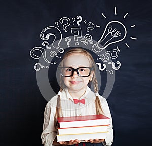 Cheerful child school girl student with stack of book