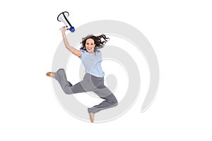 Cheerful classy businesswoman jumping while holding megaphone