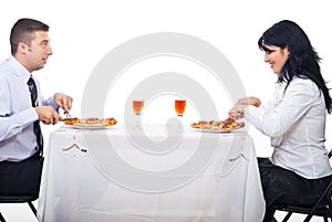 Cheerful couple eating pizza