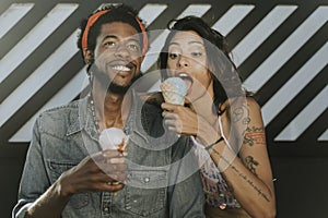 Cheerful couple enjoying ice cream