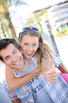 Cheerful couple enjoying travelling