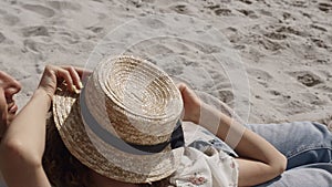 Cheerful couple relaxing sand beach closeup. Attractive woman lying on man chest