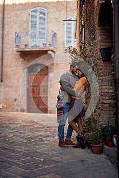 Cheerful couple travelling in European