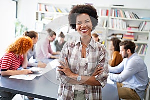 Cheerful coworkers in office during company meeting