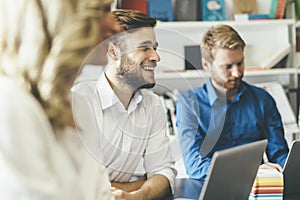 Cheerful coworkers in office