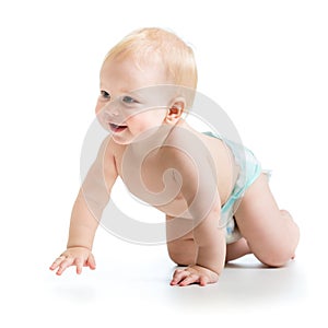 Cheerful crawling baby boy isolated on white