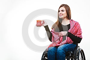 Cheerful crippled lady on wheelchair.