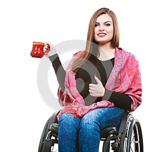 Cheerful crippled lady on wheelchair.