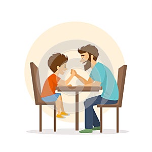 Cheerful cute father and son arm wrestling