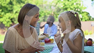 Cheerful daughter hugging happy mother, trustful family relations, togetherness