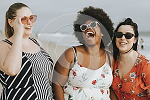 Cheerful diverse plus size women at the beach