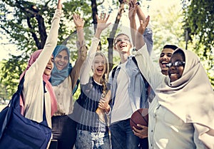 Cheerful diverse teenagers in the park photo