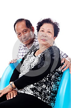 Cheerful Elderly Asian Senior Couple in Studio Portrait