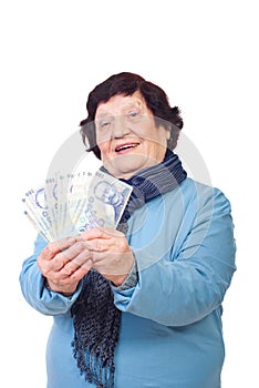 Cheerful elderly holding money