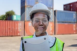 Cheerful factory worker woman in hard hat smiling and looking at camera, Happiness Female engineers for concept