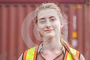 Cheerful factory worker woman smiling and looking at camera, Happiness Female engineers concept