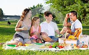 Cheerful family picnicking
