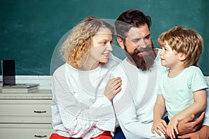 Cheerful family playing with set for creativity. Teachers day. Young happy family schooling math together. Happy school