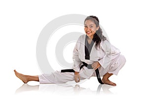 Cheerful female fighter physical training and stretching