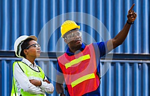 Cheerful female shipping company smiling with arms crossed, worker man point to the sky, with clipping path