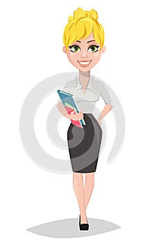 Cheerful female teacher standing with books.