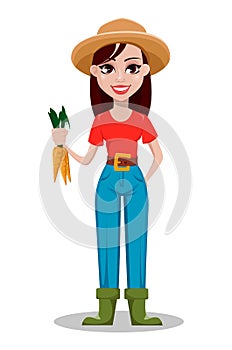 Cheerful gardener woman rancher holding fresh carrots