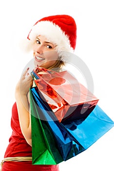 Cheerful girl with Chrismas presents