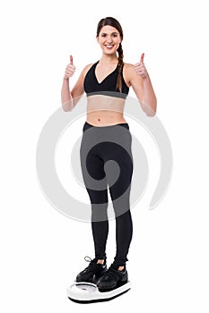 Cheerful girl excited with results as she lost weight
