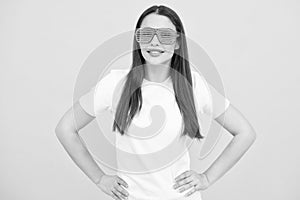 Cheerful girl In large bif funny party glasses sunglasses. Portrait of young woman wearing funny glasses  on