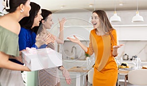 Cheerful girlfriends are happy to see each other at bachelorette party or party