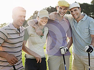 Cheerful Golfers On Golf Course