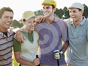 Cheerful Golfers On Golf Course