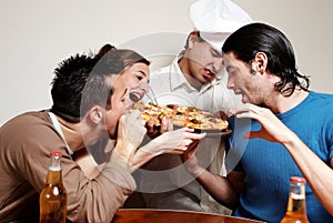 Cheerful group of youth in a pizza
