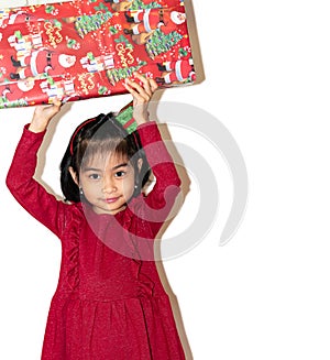 Cheerful handsome girl holding gift with her hands and smiling isolated over white