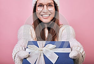 A cheerful happy girl stands. Cool give joy. Smiling, glasses