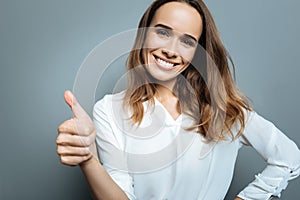 Cheerful happy woman being in a great mood