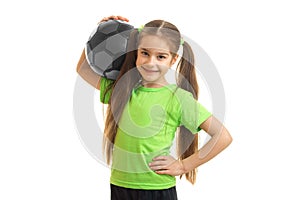 Cheerful little girl smile with soccer ball in her hands