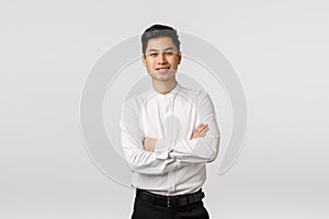 Cheerful, lucky and successful good-looking asian young male entrepreneur, finished business school and ready handle any