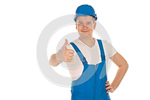 Cheerful male builder in blue uniform